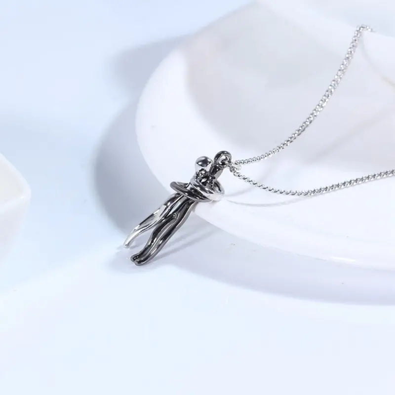 Couple Hugging Pendant Necklace